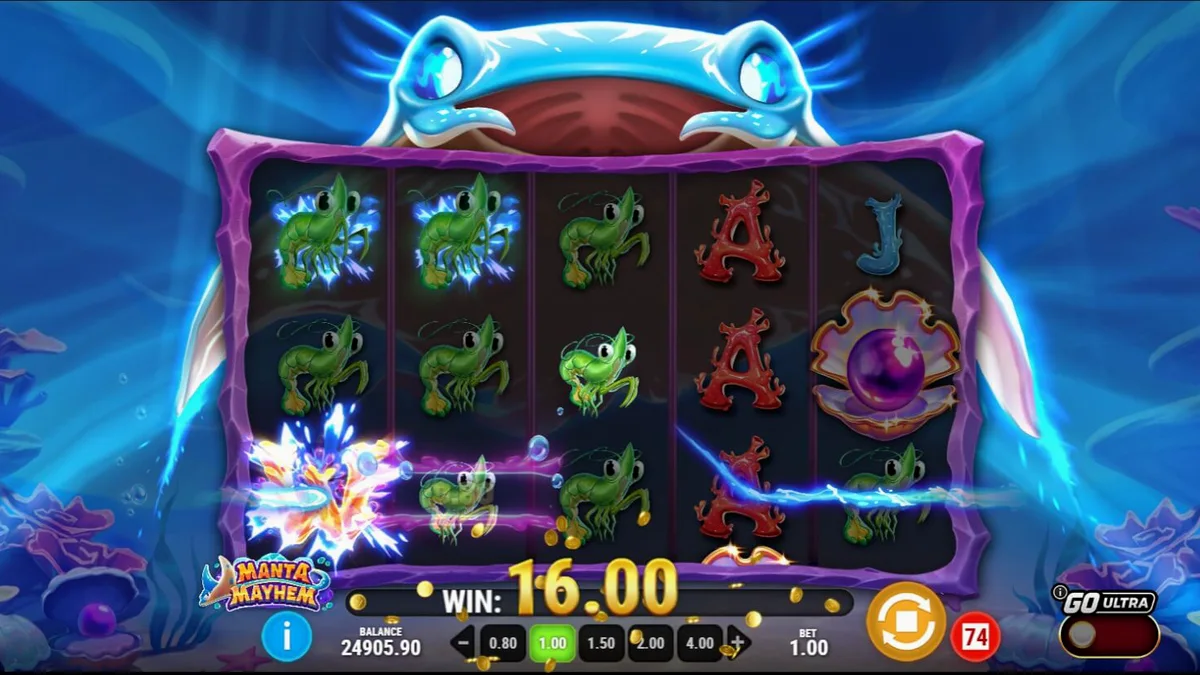 Manta Mayhem slot underwater theme featuring a manta ray and coral reef